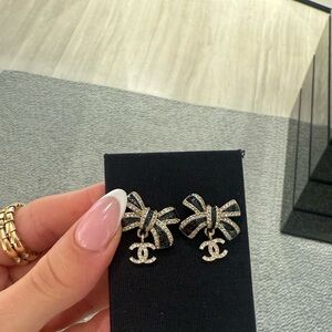 CHANEL Black and Gold Bow Earrings